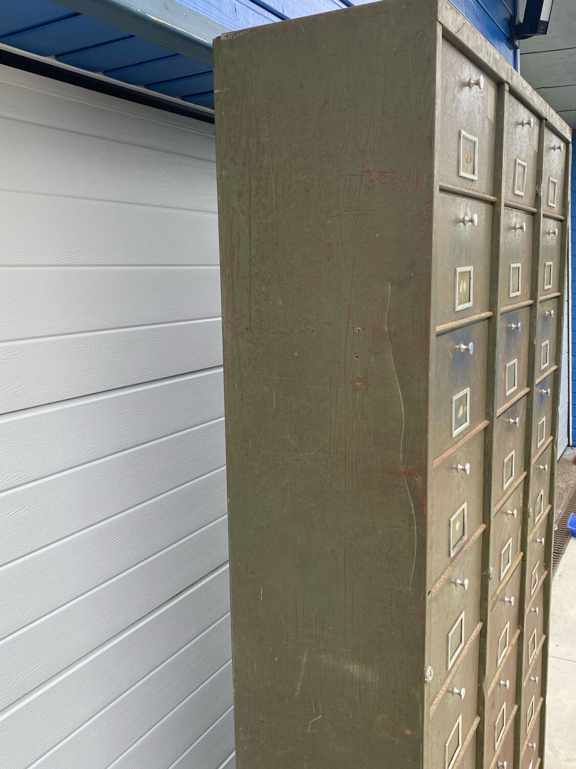 Military metal cabinet with hinged door
