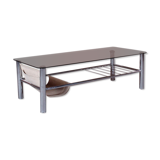 Glass rectangle coffee table with magazine rack, circa 1970