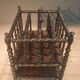 Rosewood magazine rack on casters