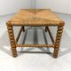 Low oak bobbin stool with rush seat 1930’s