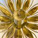 Sunburst ceiling light fixture or sconce, gilt iron & exposed bulb France, 1970s
