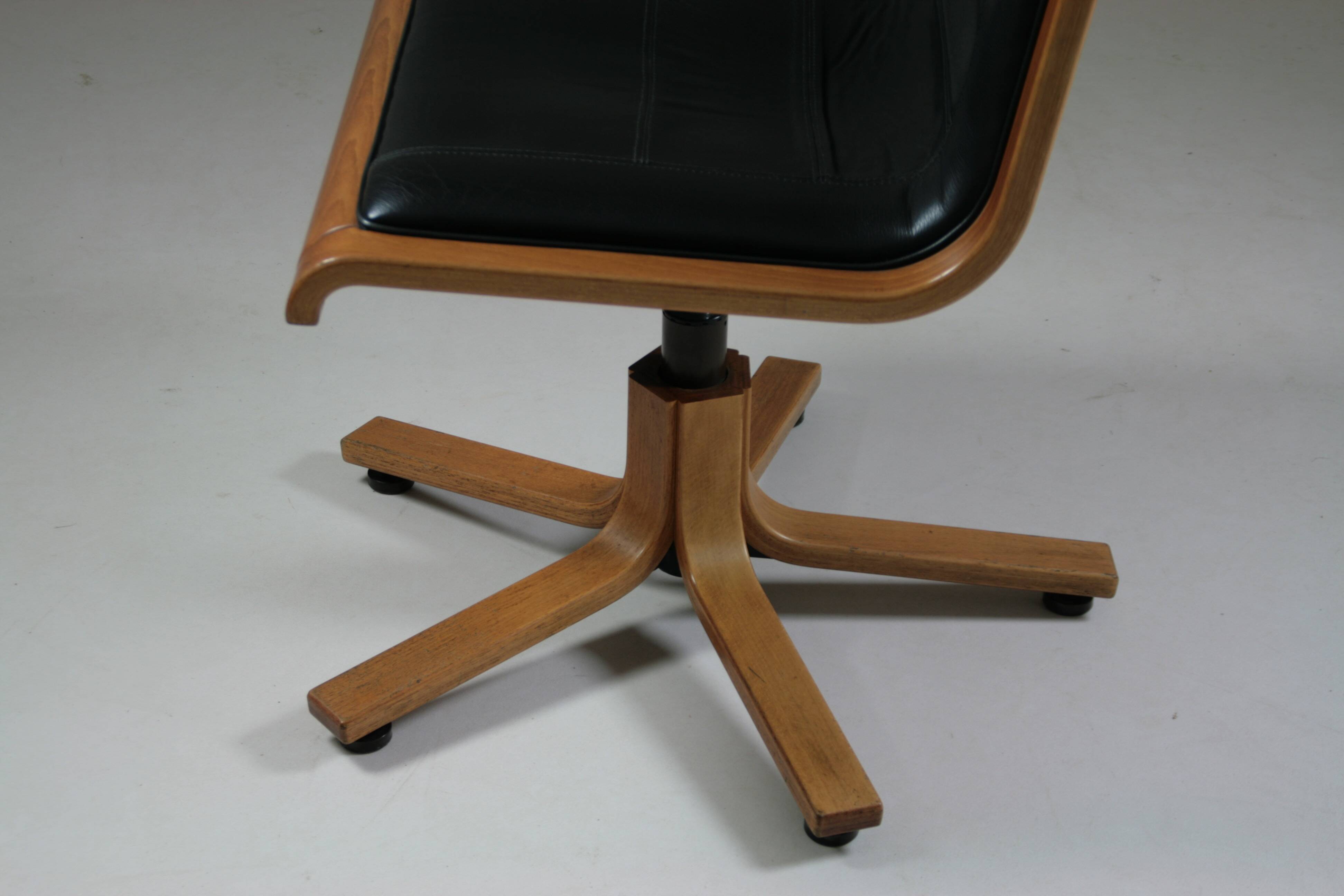 Office armchair in beech and black leather for Cofemo, Italy