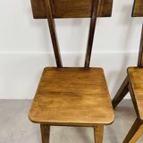 6 brutalist solid wood chairs