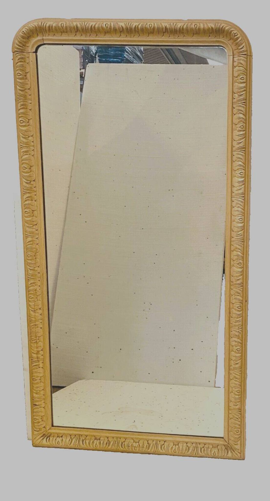 Louis Philippe mirror in wood and patinated stucco, 19th century.