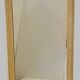 Louis Philippe mirror in wood and patinated stucco, 19th century.