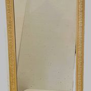 Louis Philippe mirror in wood and patinated stucco, 19th century.
