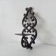 Antique wall candle holder in enamelled cast iron