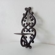 Antique wall candle holder in enamelled cast iron