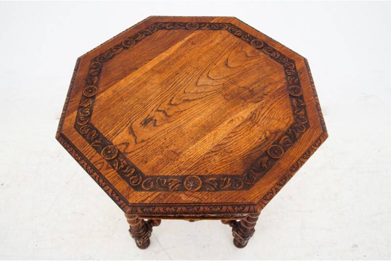 Carved table, France, circa 1910.