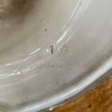 Art Deco ceiling light with a porcelain base.