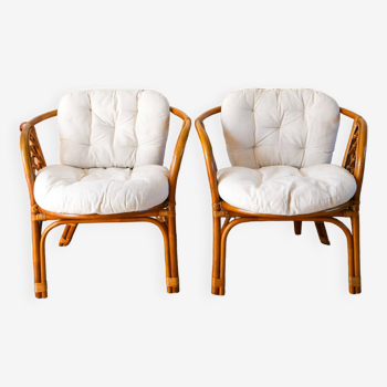 Pair of rattan and bamboo shell armchairs with linen cushions, 1960