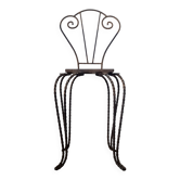Small chair / stool in twisted wrought iron and floral ceramic.