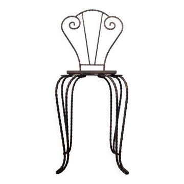 Small chair / stool in twisted wrought iron and floral ceramic.