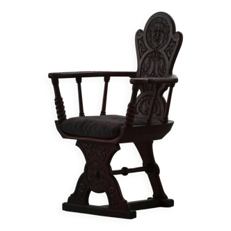 Scandinavian armchair in solid oak with cushion, folk art, early 19th century.