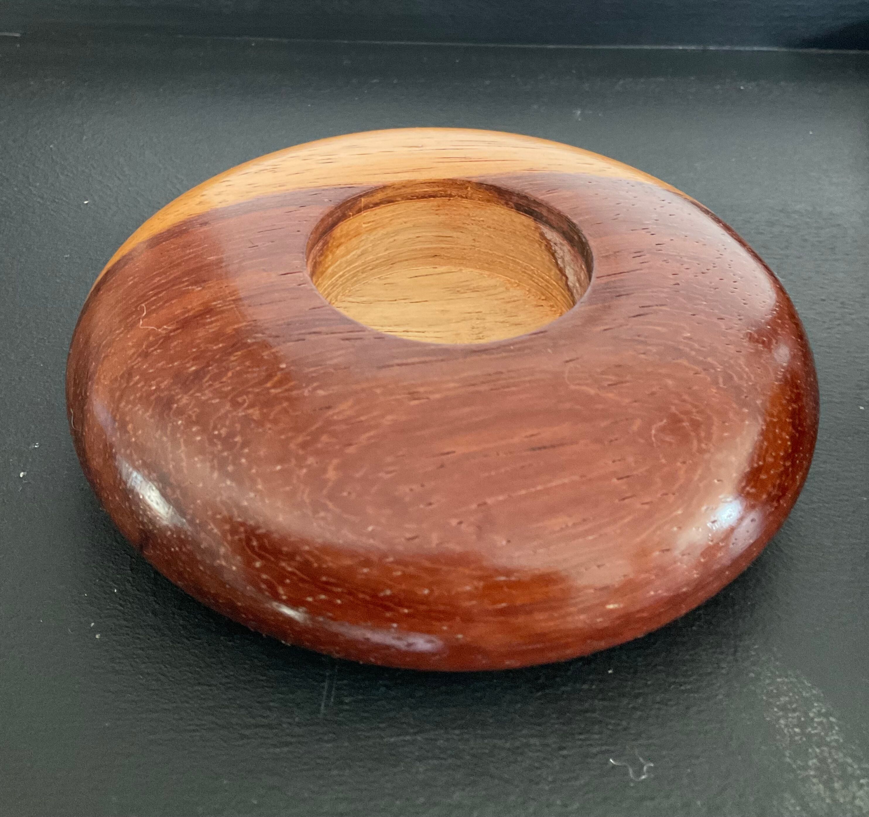 Series of 4 vintage wooden candle holders