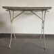 White wrought iron table