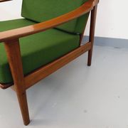 Pair of vintage Scandinavian armchairs in teak and green fabric from the 1960s.