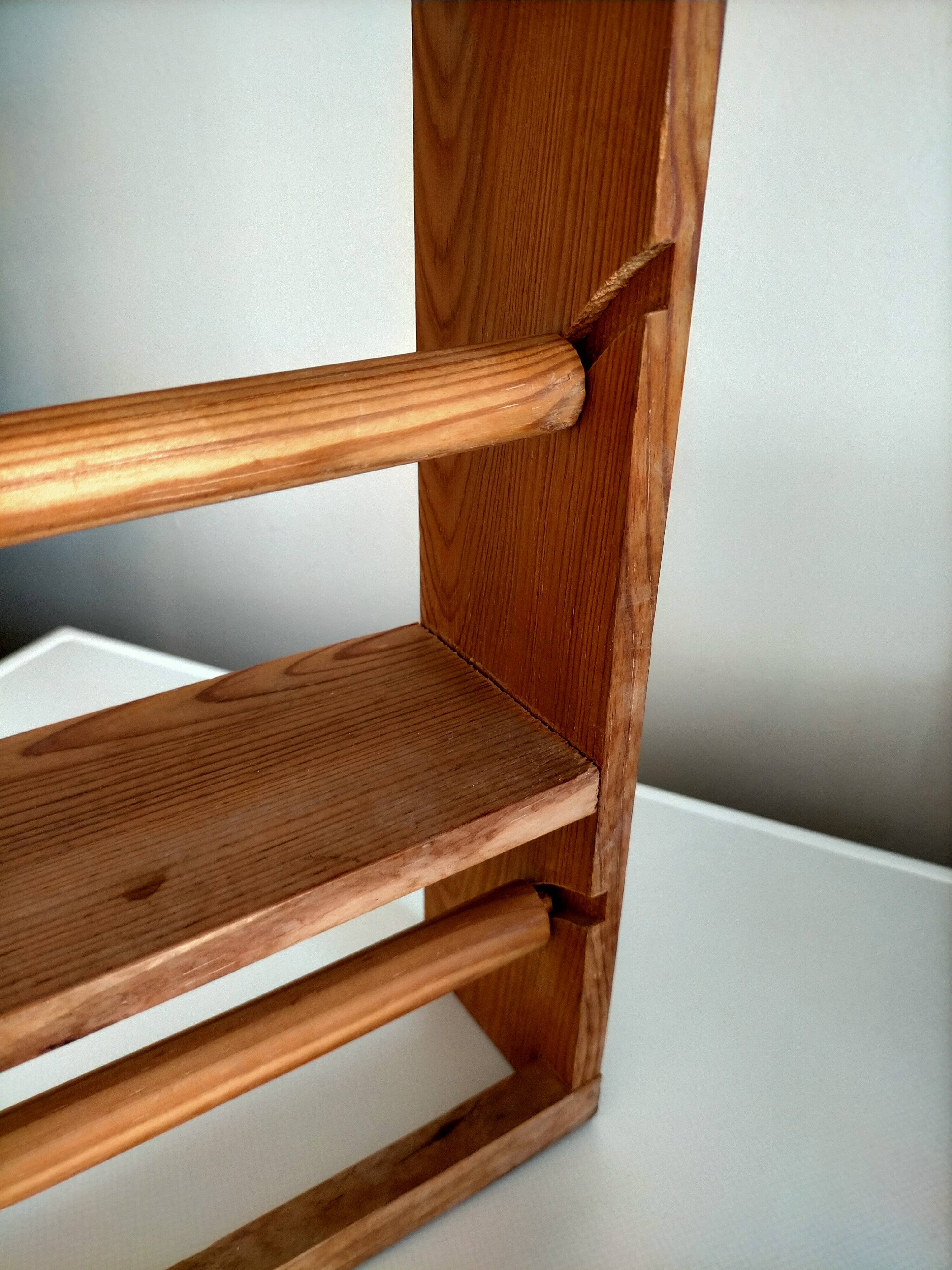 Wooden shelf with unroller wipes everything