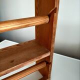 Wooden shelf with unroller wipes everything