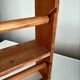Wooden shelf with unroller wipes everything