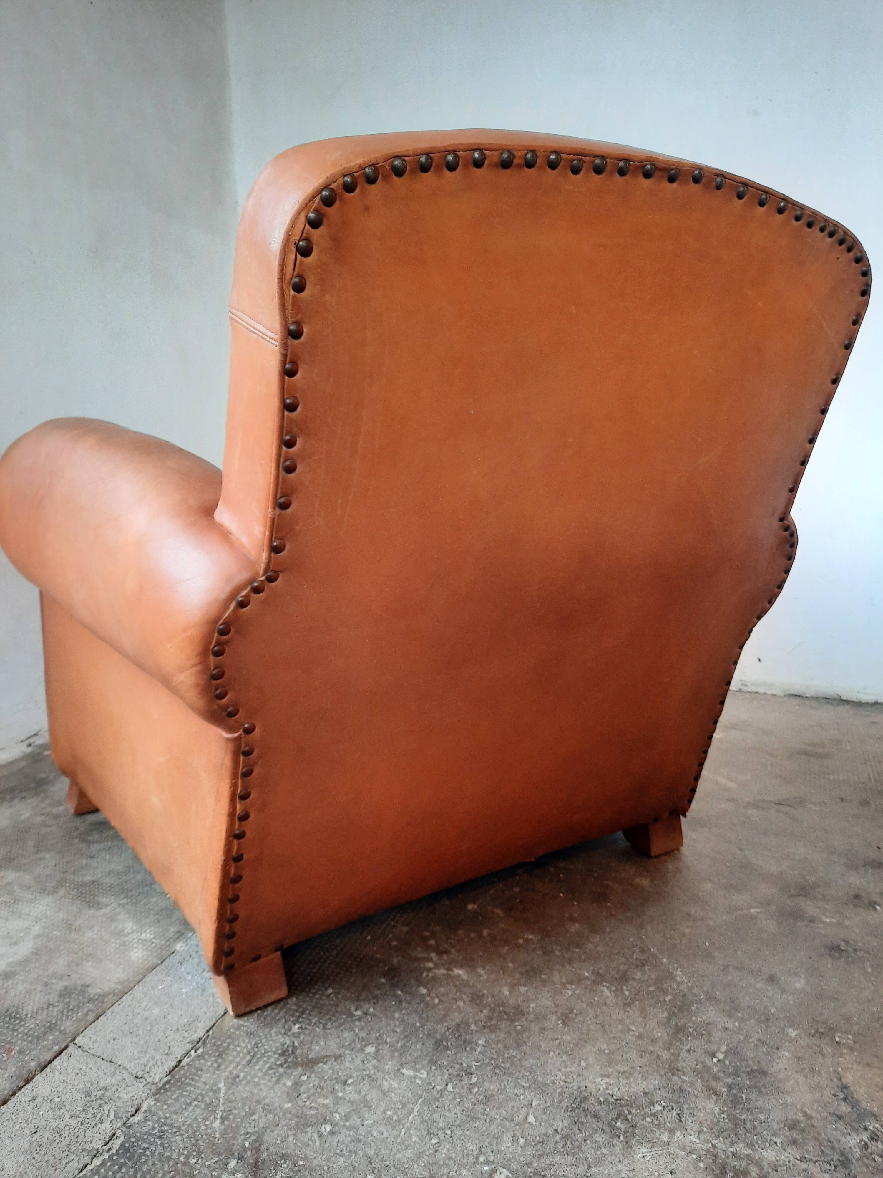 Old leather club chair 1940-1950
