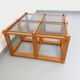 Vintage square coffee table in pine and smoked glass from the 70s and 80s.