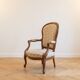 Louis XV cabriolet armchair in wood and beige fabric