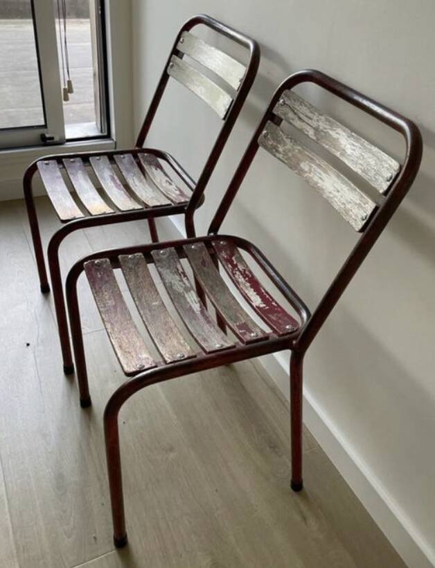 Pair of antique Tolix-style wooden and metal bistro chairs