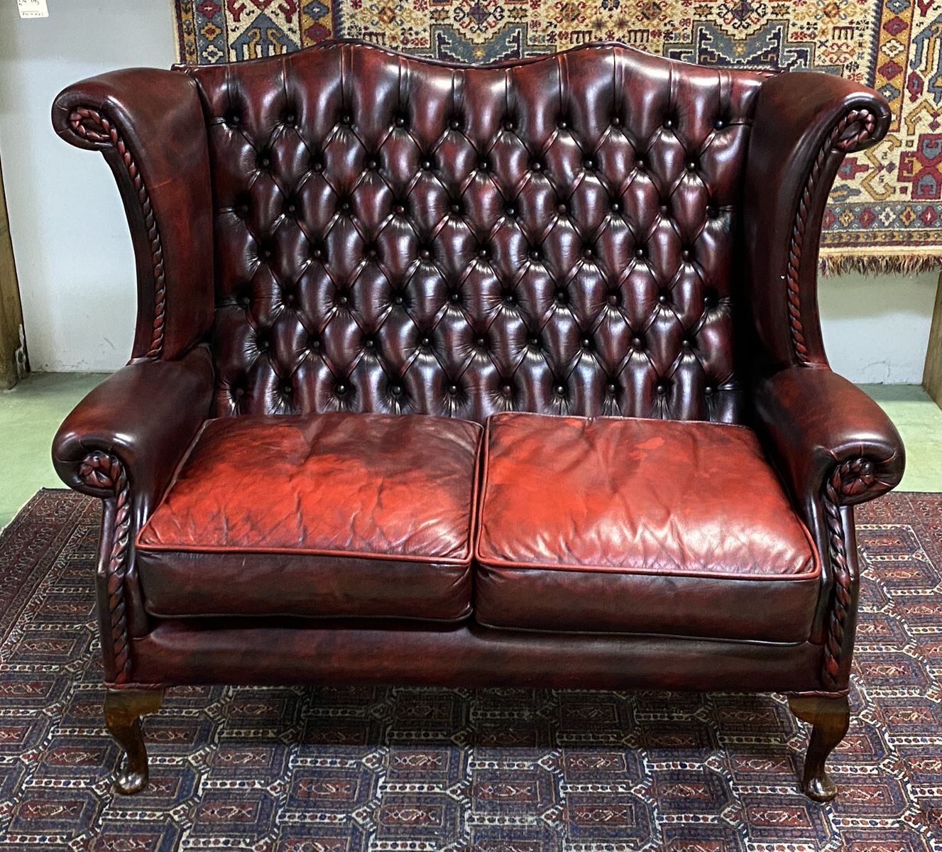 Chesterfield 2-seater leather-eared sofa from the 80s