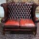 Chesterfield 2-seater leather-eared sofa from the 80s