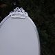 Oval mirror 66x37 Louis XVI style knot in vintage silver metal from the 70s