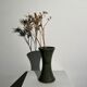 Dark green handcrafted vase with glazed ceramic grass blades
