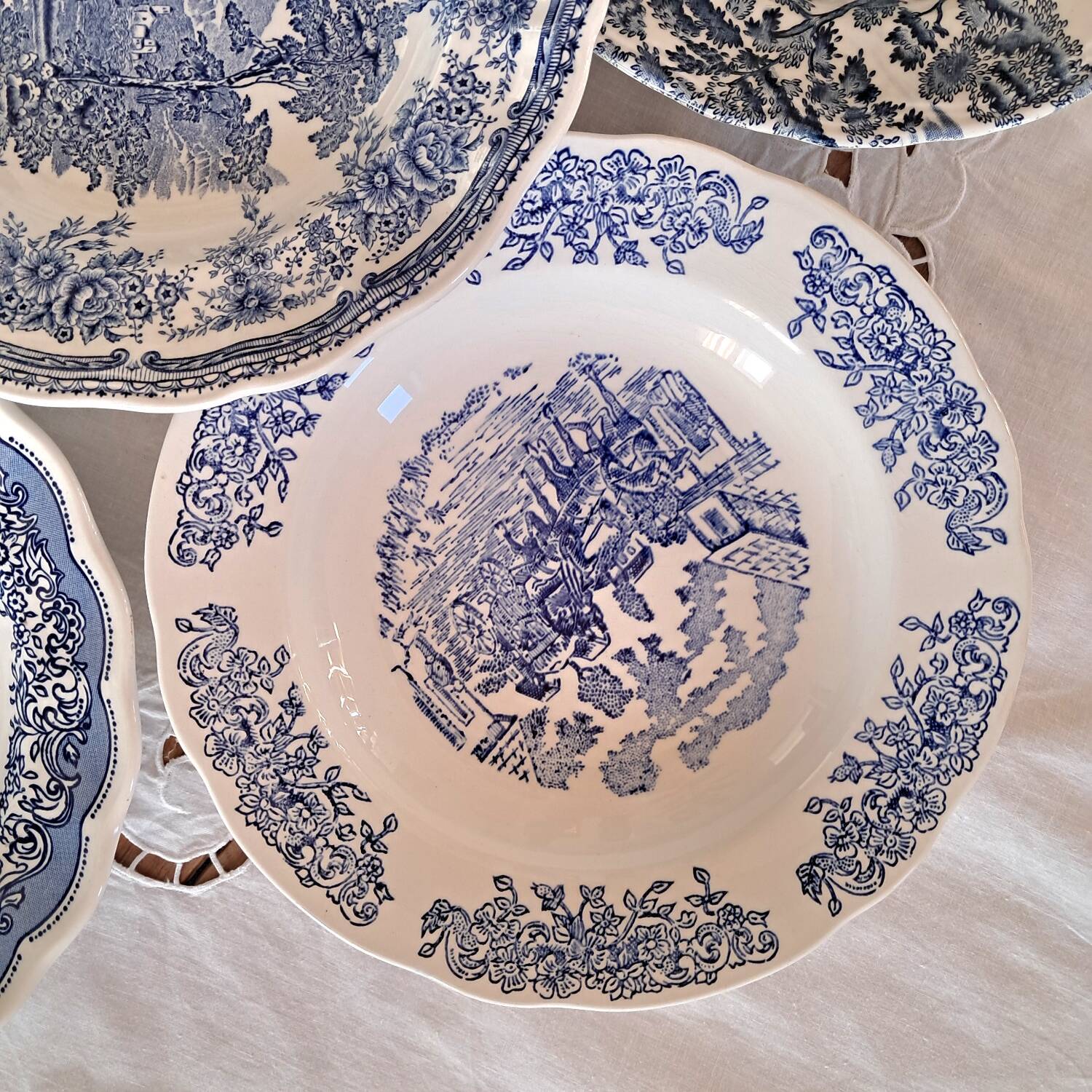 Mismatched antique soup plates