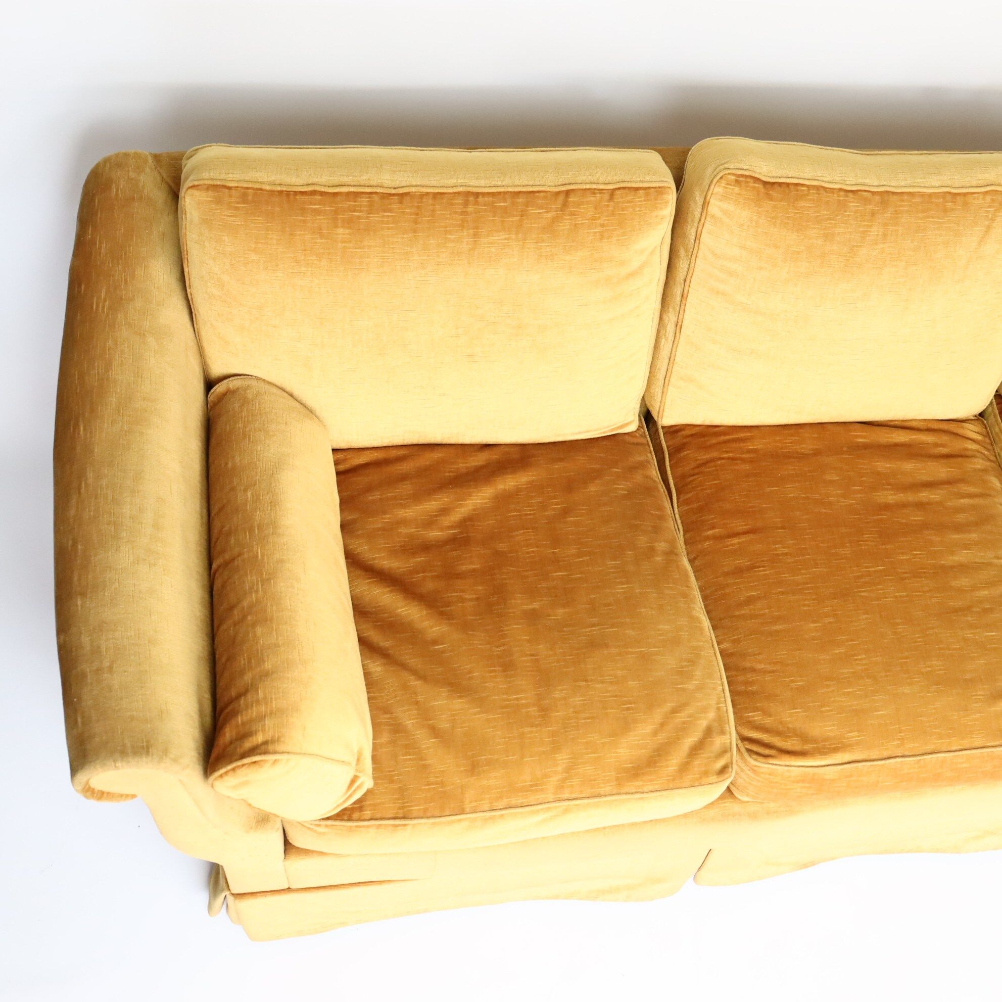 Three-seater velvet sofa