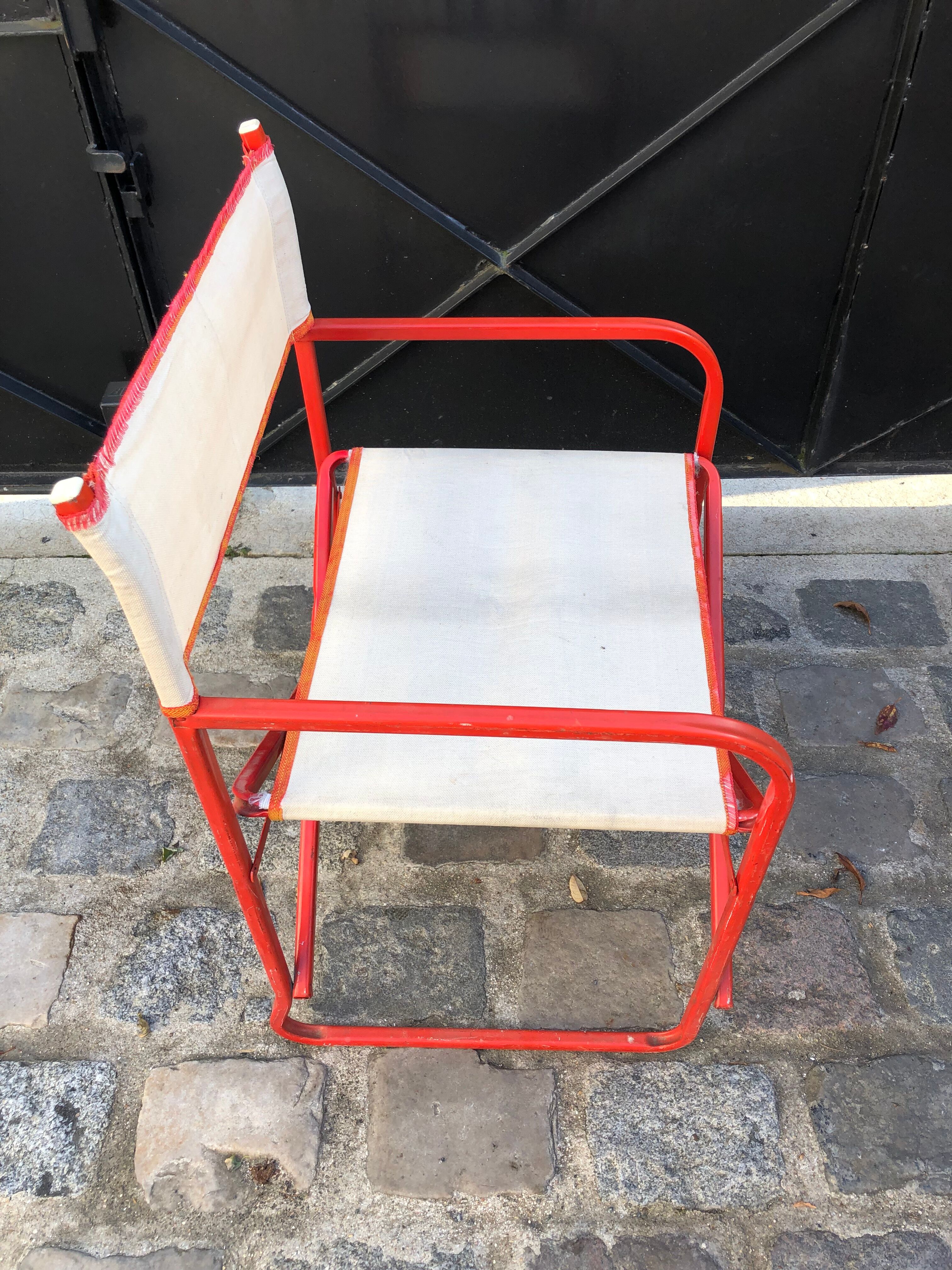 Folding metal armchair