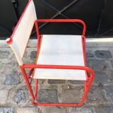 Folding metal armchair