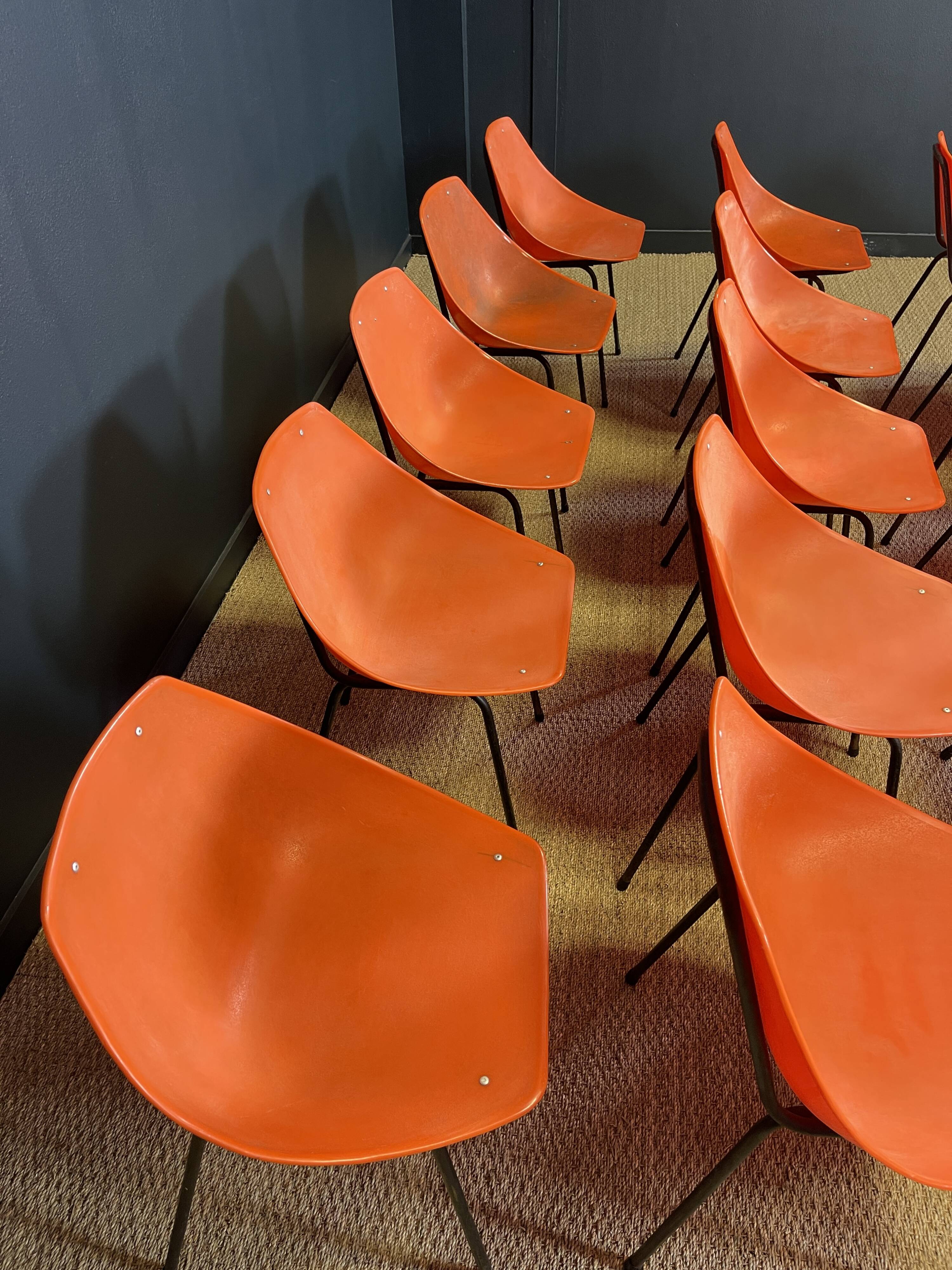 Set of 24 orange Guariche chairs