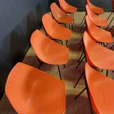 Set of 24 orange Guariche chairs