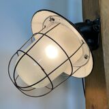 Industrial black enamel and cast iron wall lamp with iron grid, 1960s