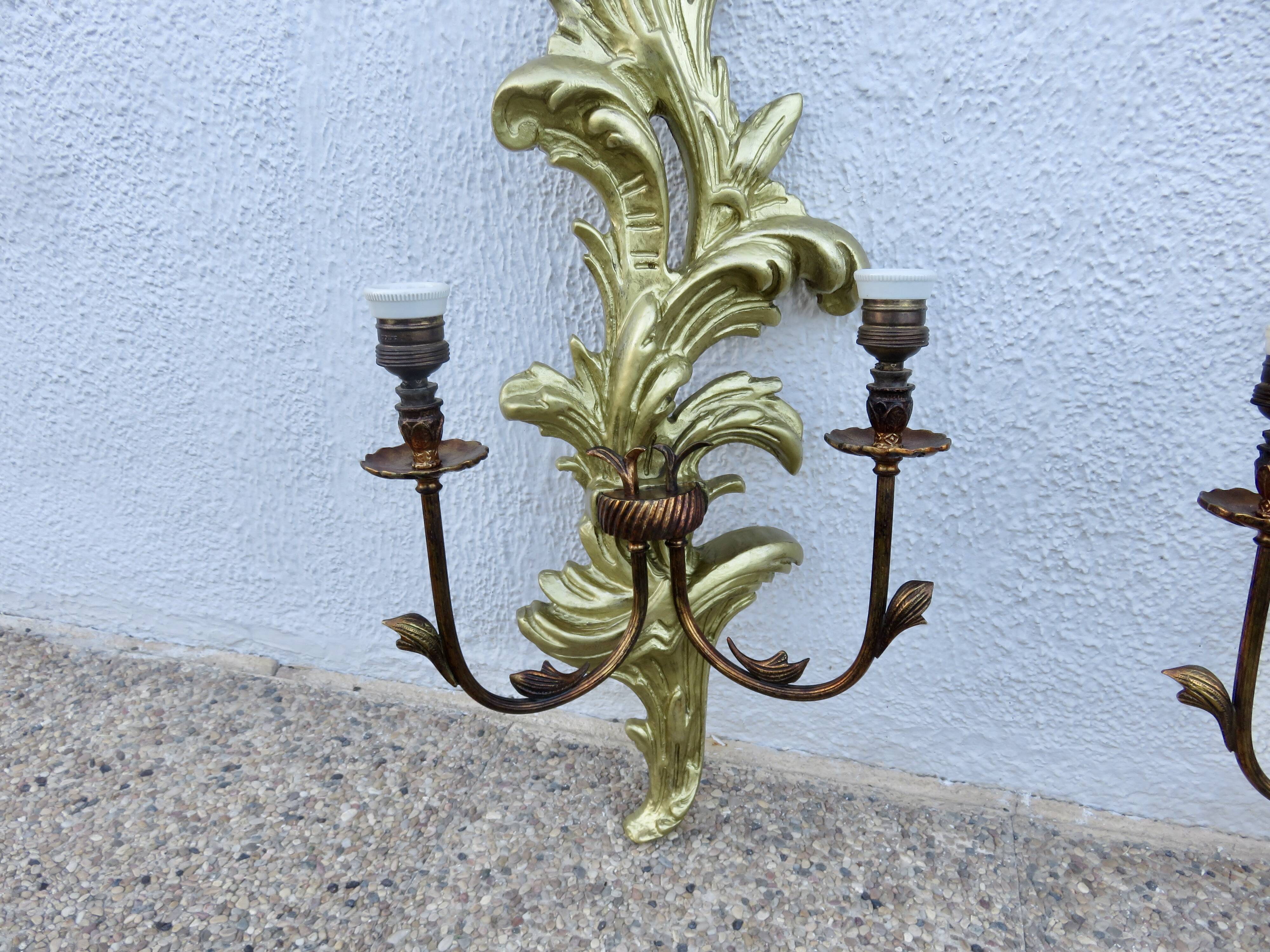 Pair of 86cm castle sconces in gilded wood from the 1940s