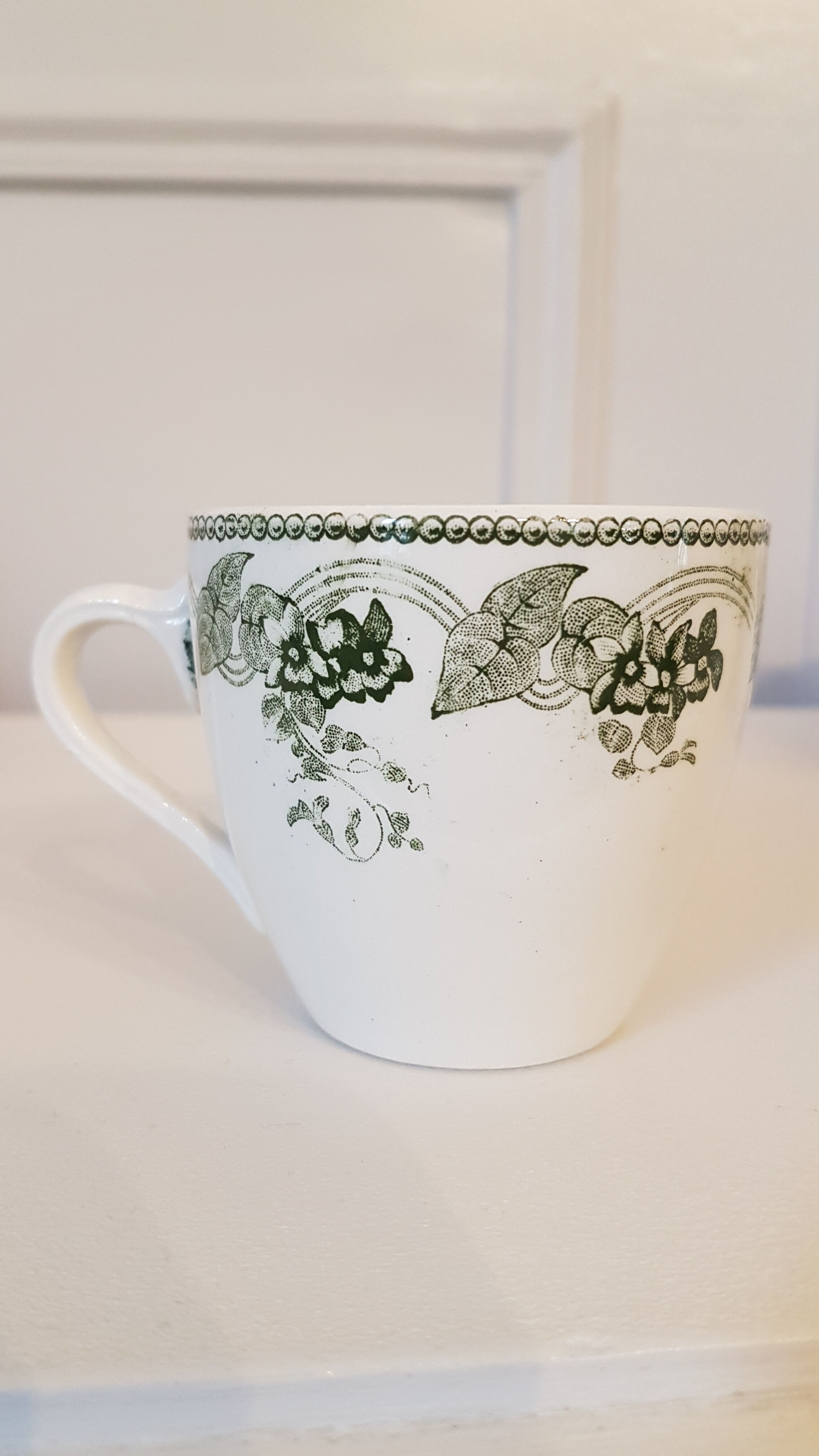 Set of 11 porcelain cups