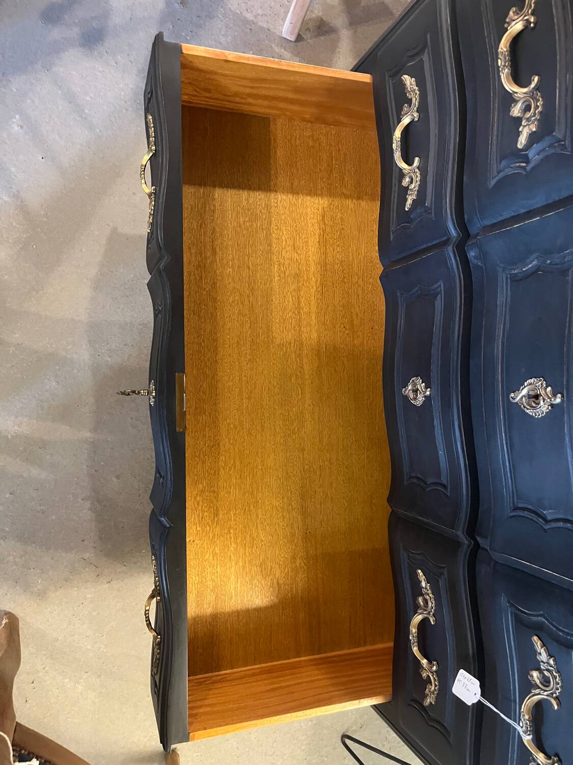 Black and wood chest of drawers