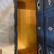 Black and wood chest of drawers