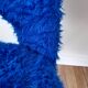 Chair in royal blue moumoute and brass legs 60s