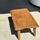 Coffee table in blond teak quadripod