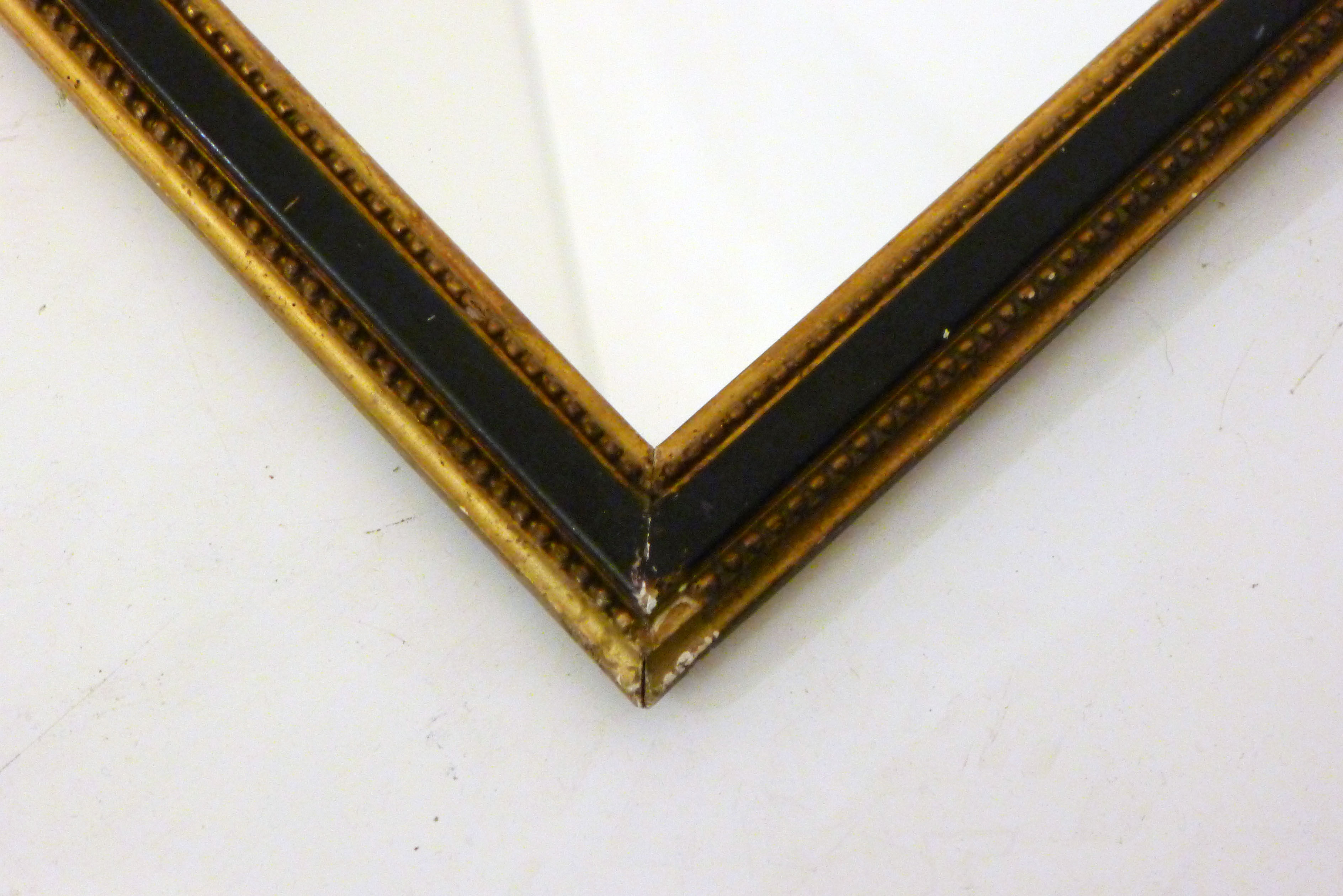 Miroir noir et frises de perles dorées - 42x42cm