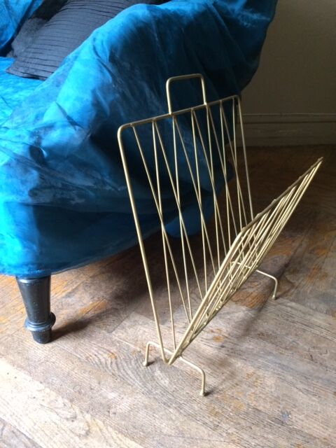 Gold metal magazine holder