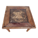 Table basse sculptée