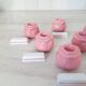 Pink candlesticks and porcelain knife holders