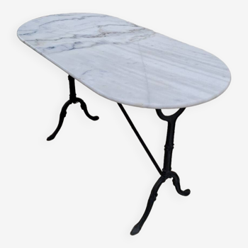 Cast iron bistro table and old oval marble top